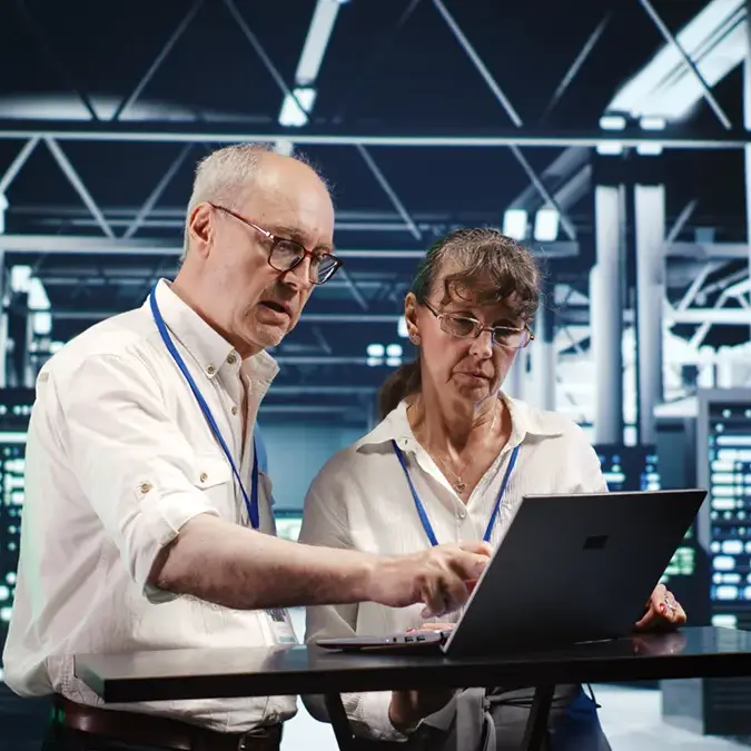 colleagues-crosschecking-server-parts